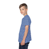 Child wearing a blue geometric patterned shirt on a white background