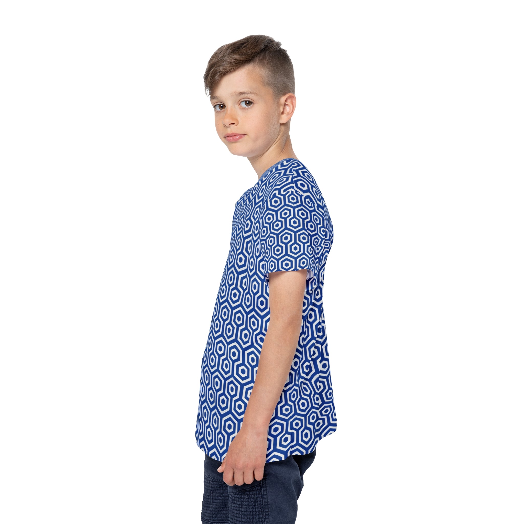 Child wearing a blue geometric patterned shirt on a white background