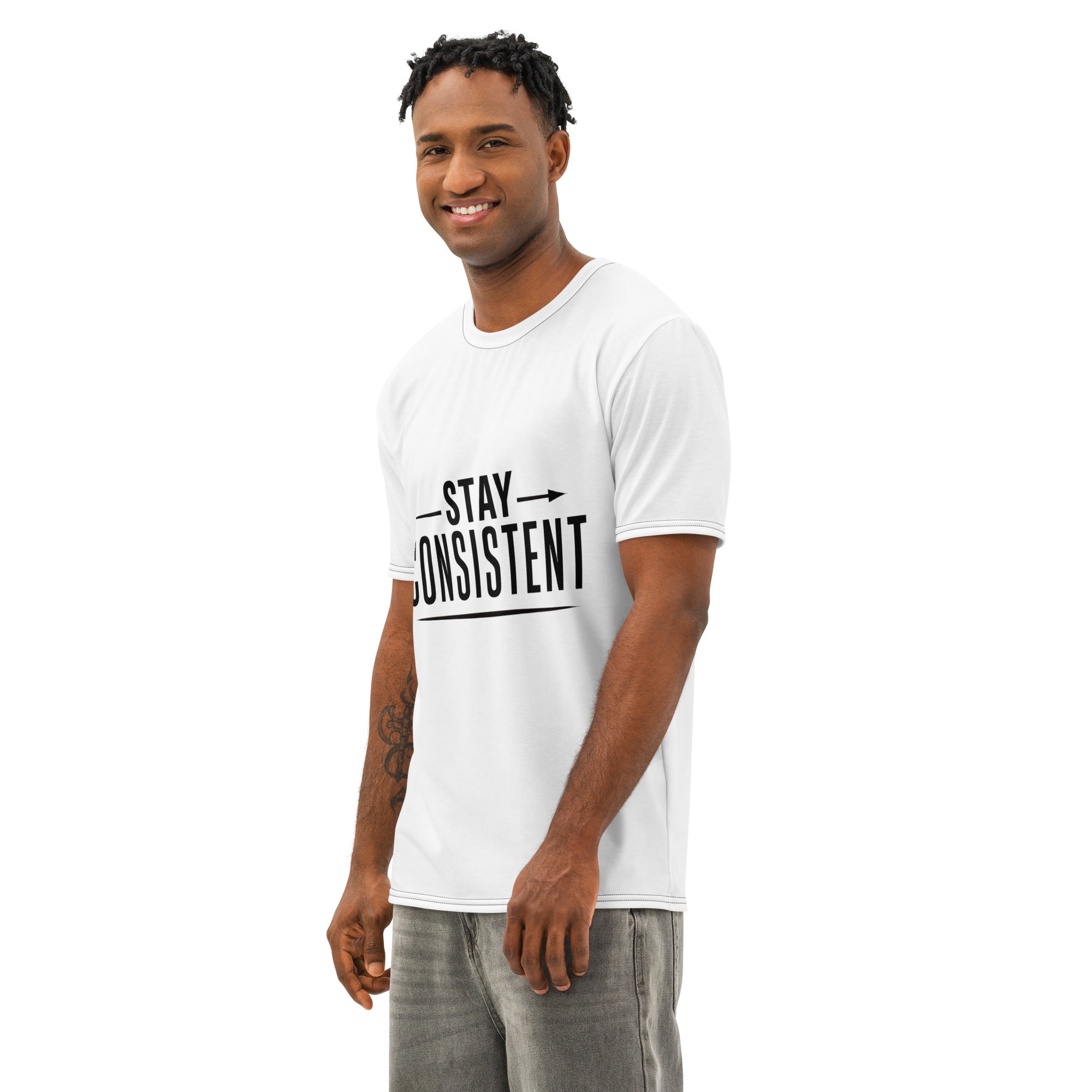 Man wearing a white t-shirt with 'Stay Consistent' text on a white background