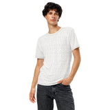 Man wearing a white t-shirt with geometric pattern on a white background