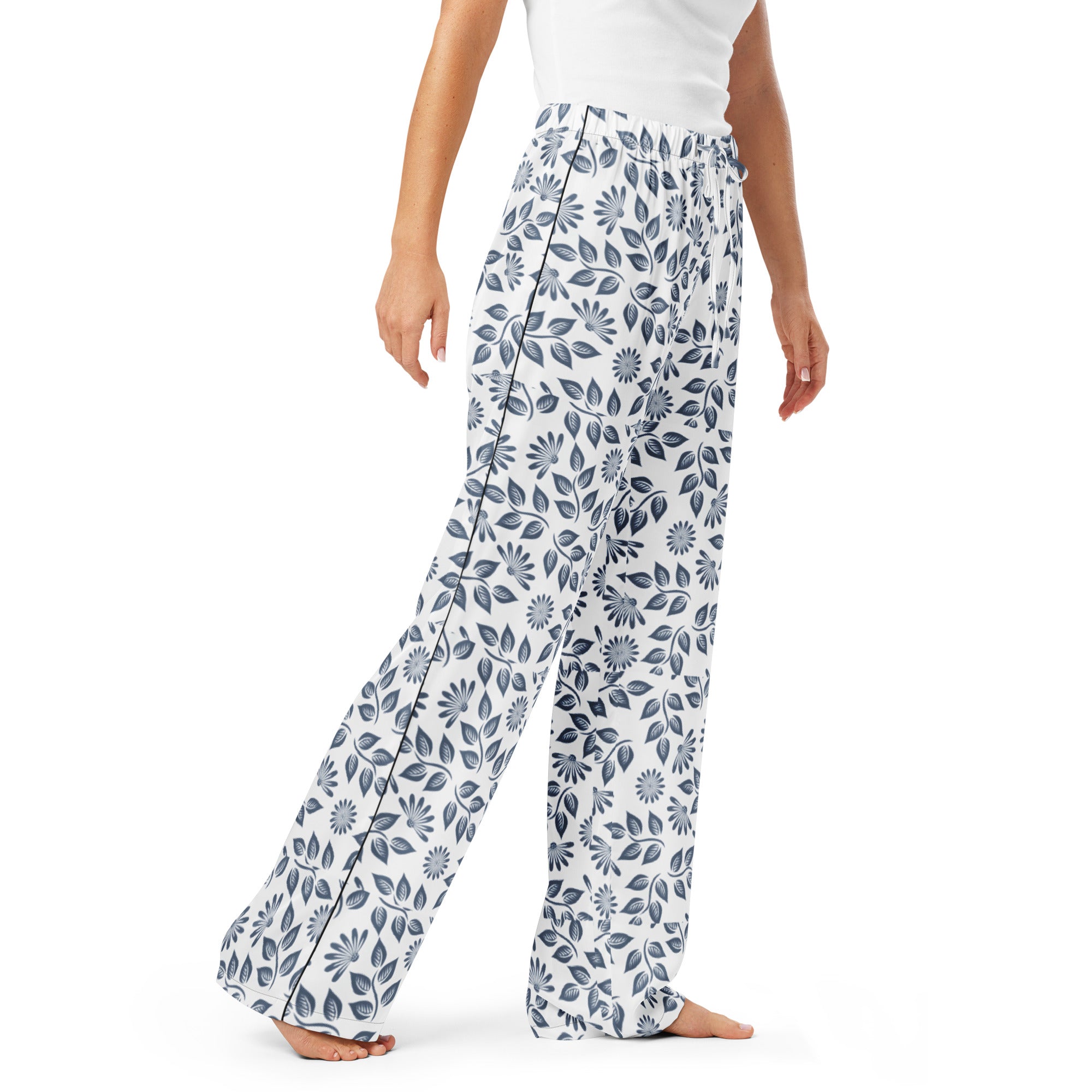 Light blue pajama pants worn by a person on a white background