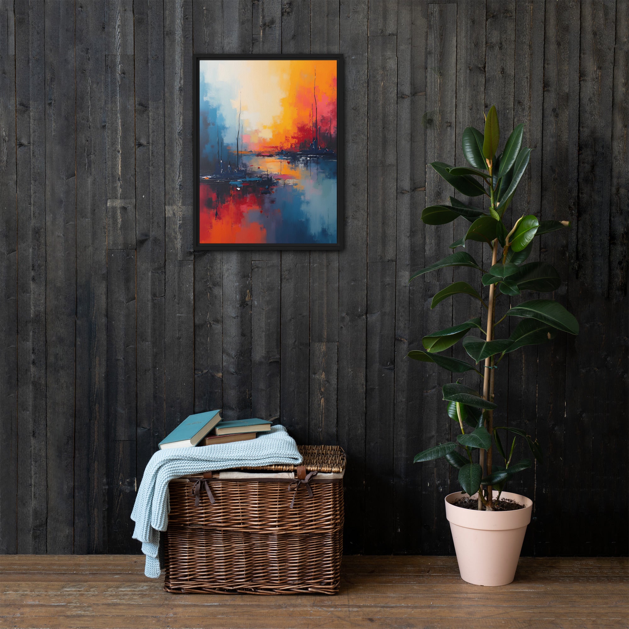 Framed abstract painting on a dark wooden wall with a wicker basket and plant below.