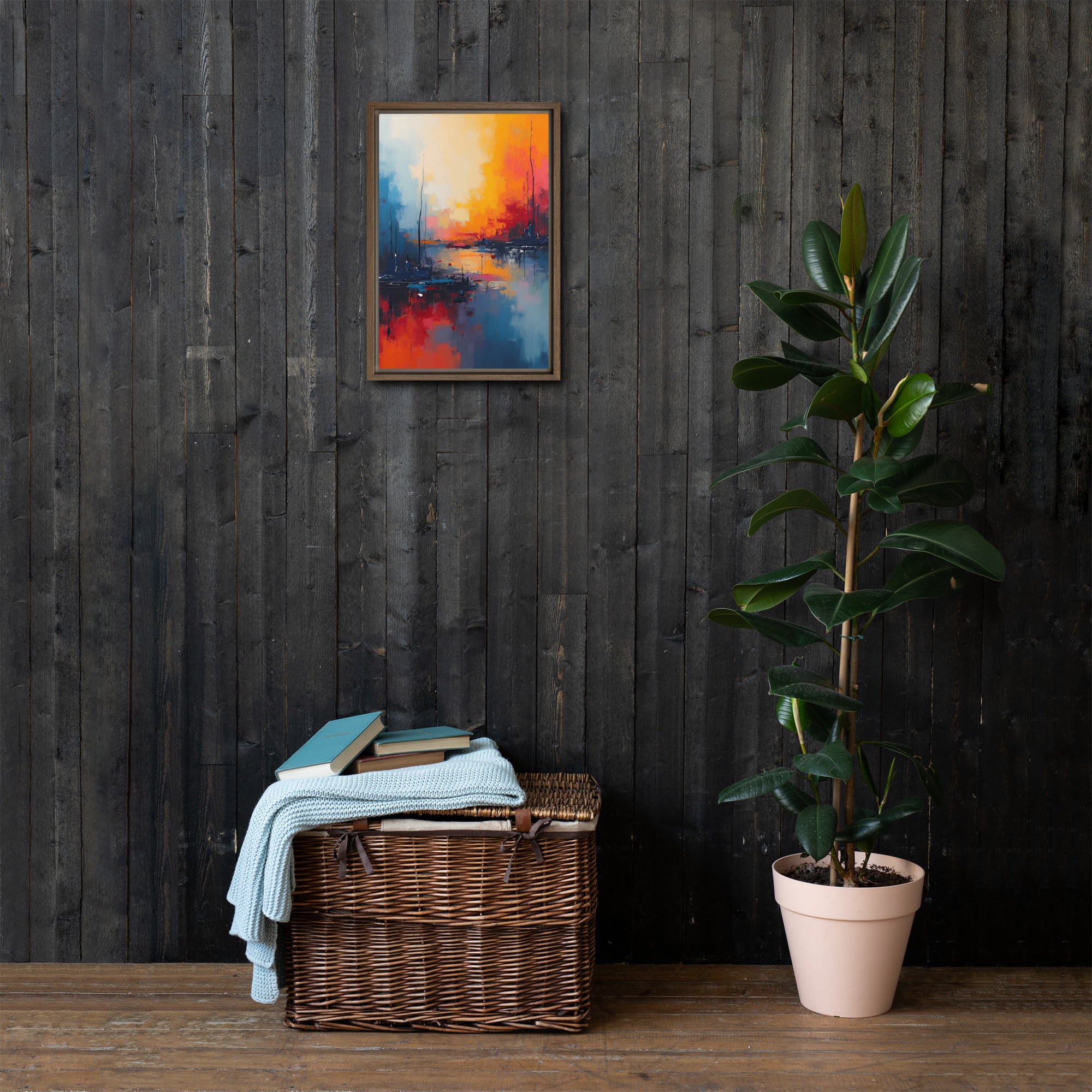 Wicker basket with folded clothes against a dark wooden wall with a colorful abstract painting.