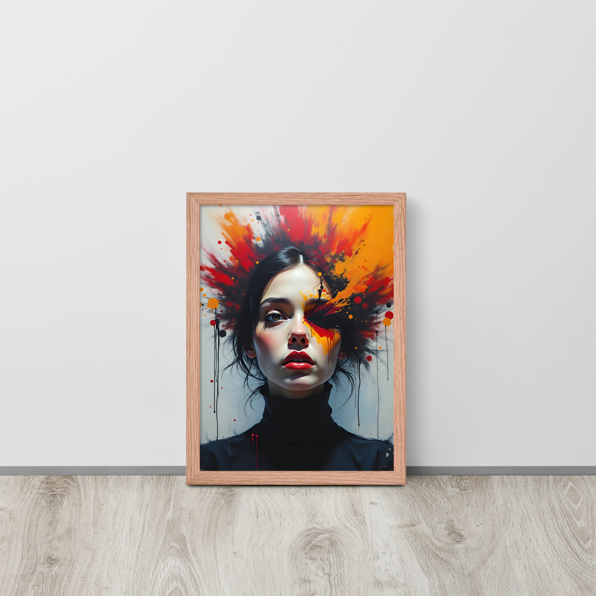 Framed artwork of a woman's face with colorful abstract design on a white wall.