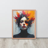 Framed artwork of a woman's portrait with abstract colorful design on a white wall.