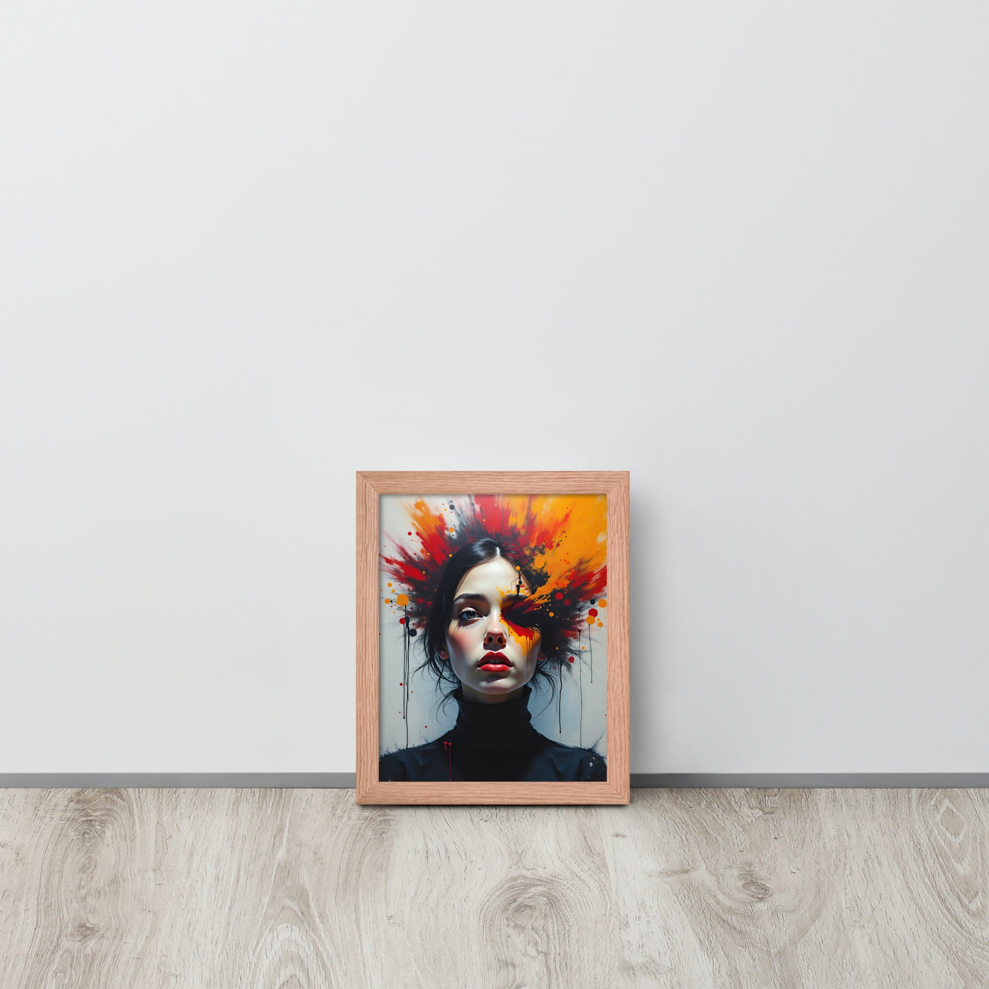 Framed artwork of a woman with colorful hair on a white wall.