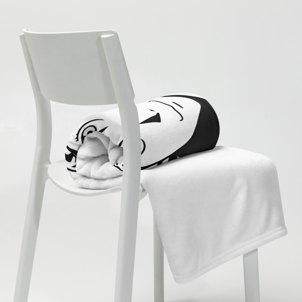 White chair with a black and white cushion on a plain background