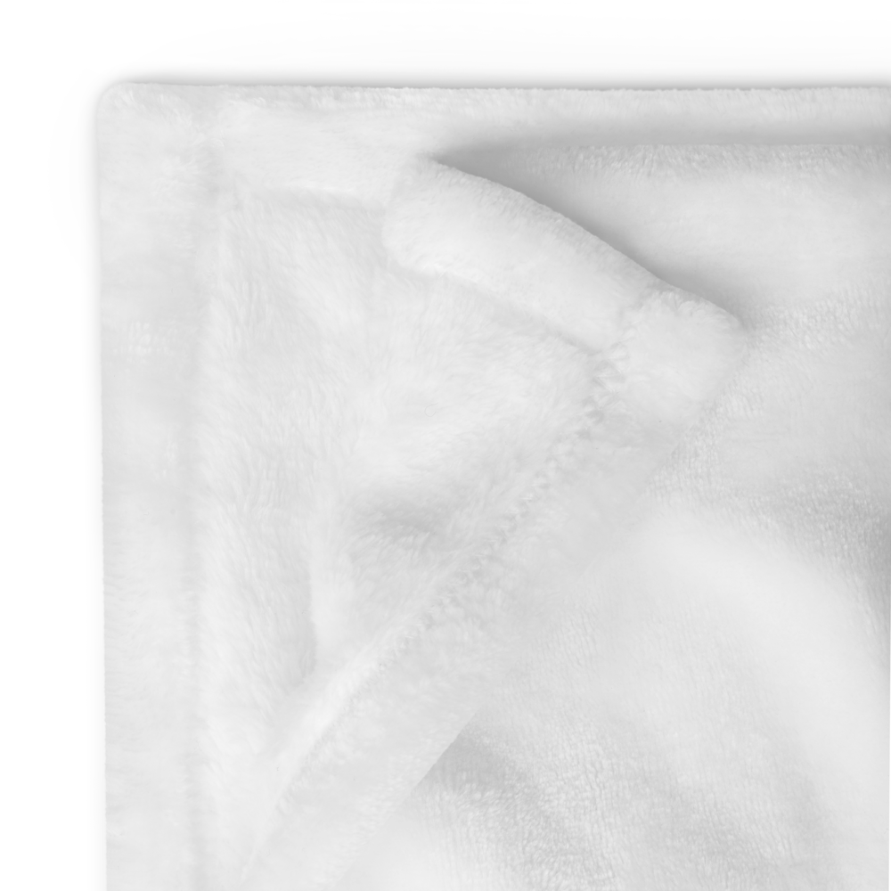 Close-up of white fabric with a subtle pattern on a white background