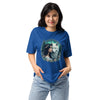 Person wearing a blue t-shirt with a graphic of a woman and a wolf.