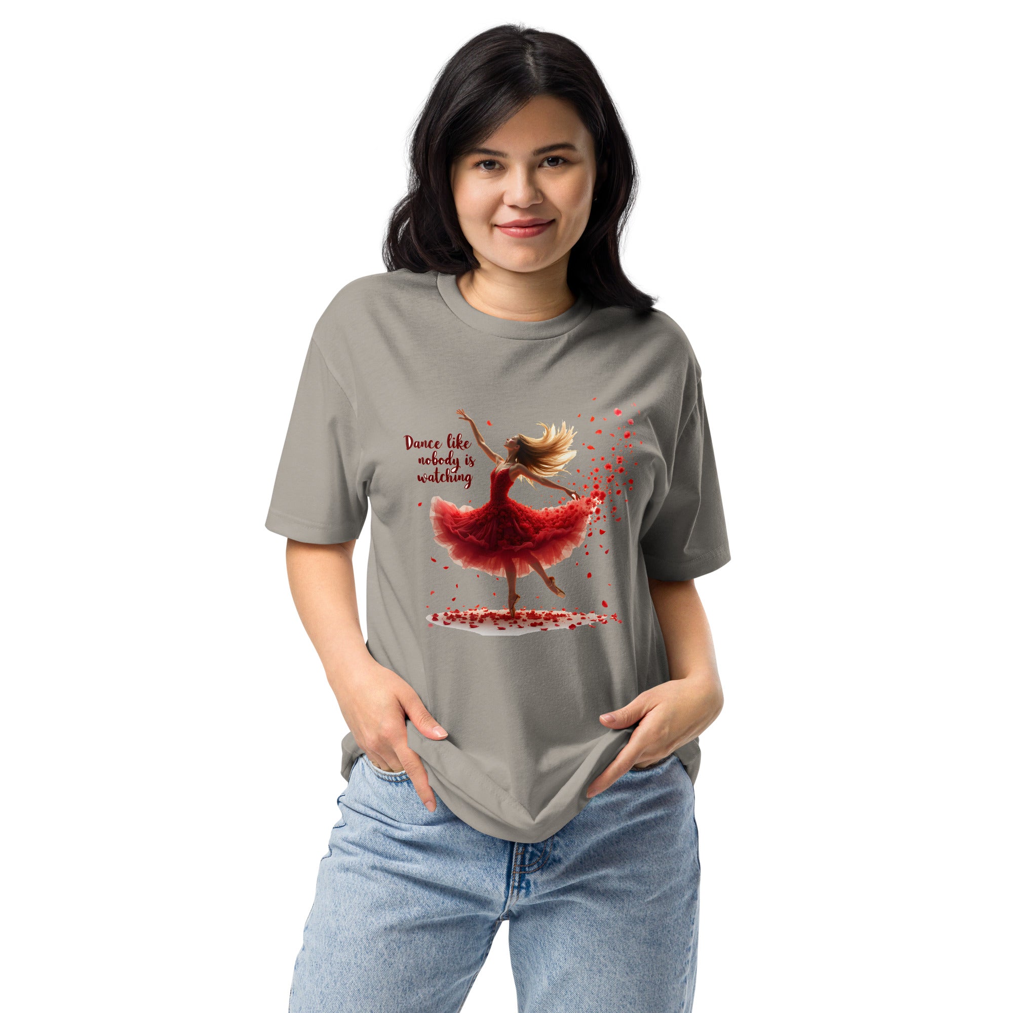 Person wearing a gray t-shirt with a graphic design of a dancer in a red dress on a white background
