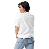 Woman wearing a white t-shirt and blue jeans on a white background