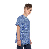 Child wearing a blue and white patterned shirt on a white background