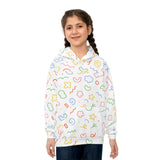 Girl wearing a white hoodie with colorful geometric pattern on a white background
