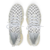 White sneakers with black pattern on a white background