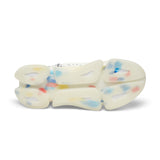 White silicone baby teether with colorful accents on a white background