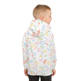 Child wearing a colorful patterned raincoat on a white background