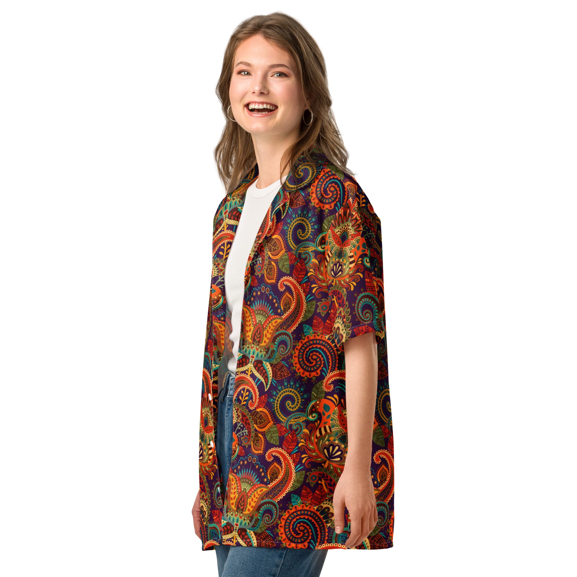 Woman wearing a colorful patterned shirt on a white background