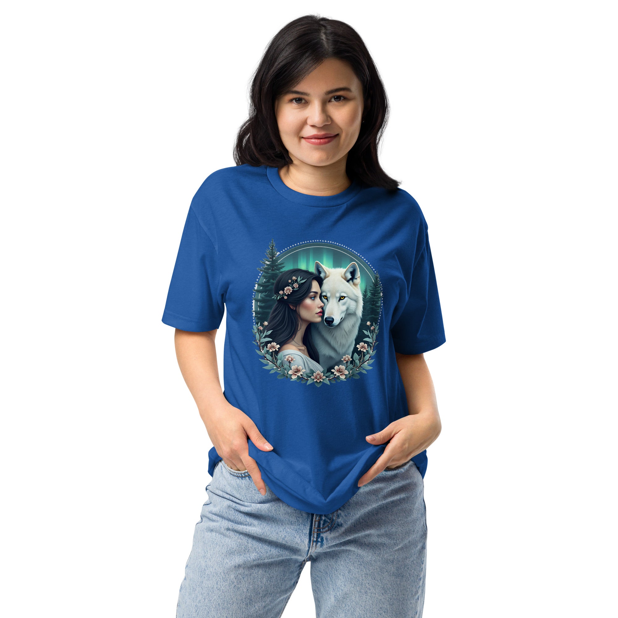 Person wearing a blue t-shirt with a graphic of a woman and a wolf.