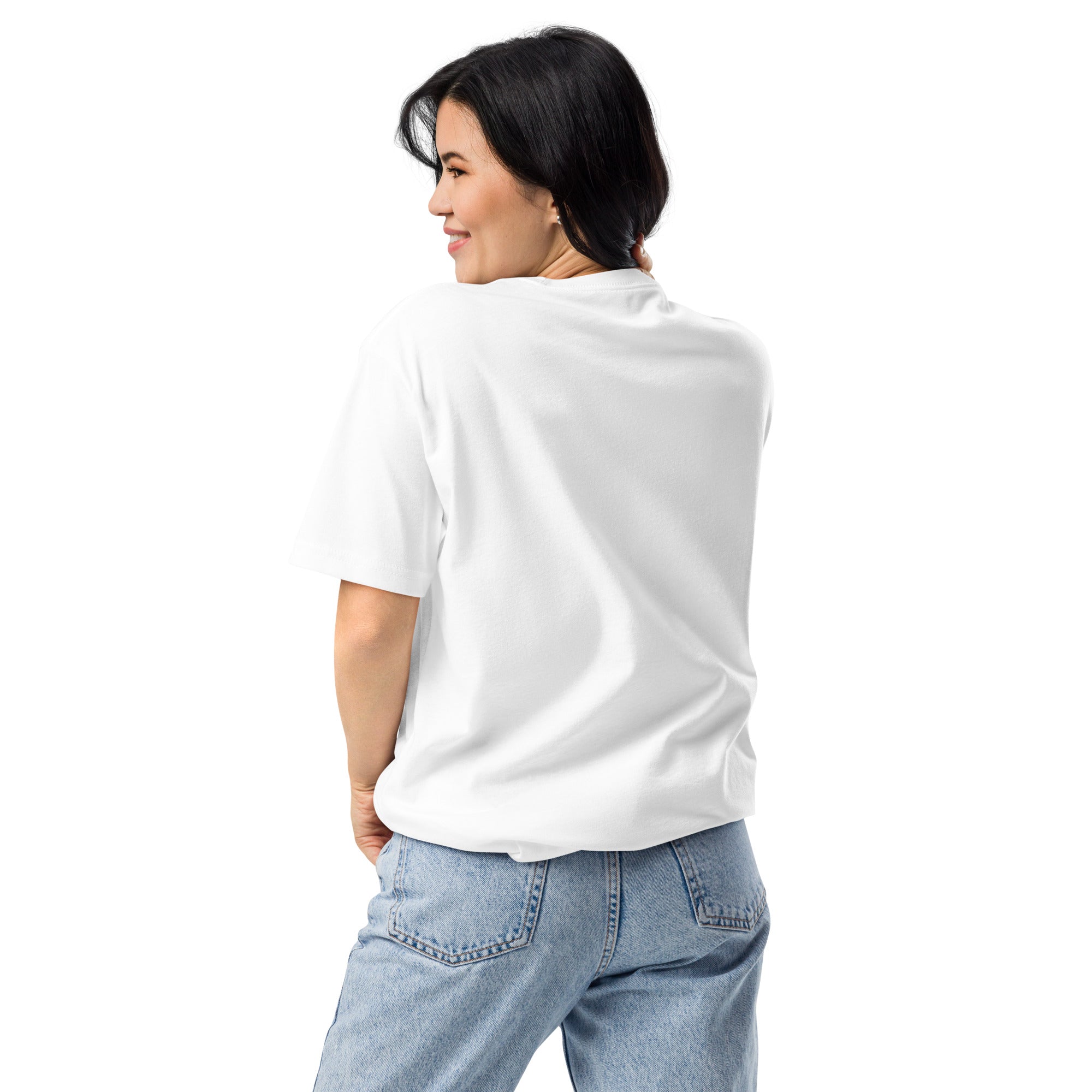 Woman wearing a white t-shirt and blue jeans on a white background